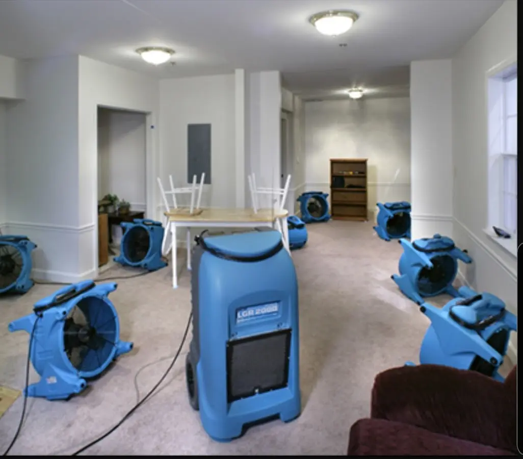 Air movers and dehumidifier setup for Water Damage Restoration in Collinsville